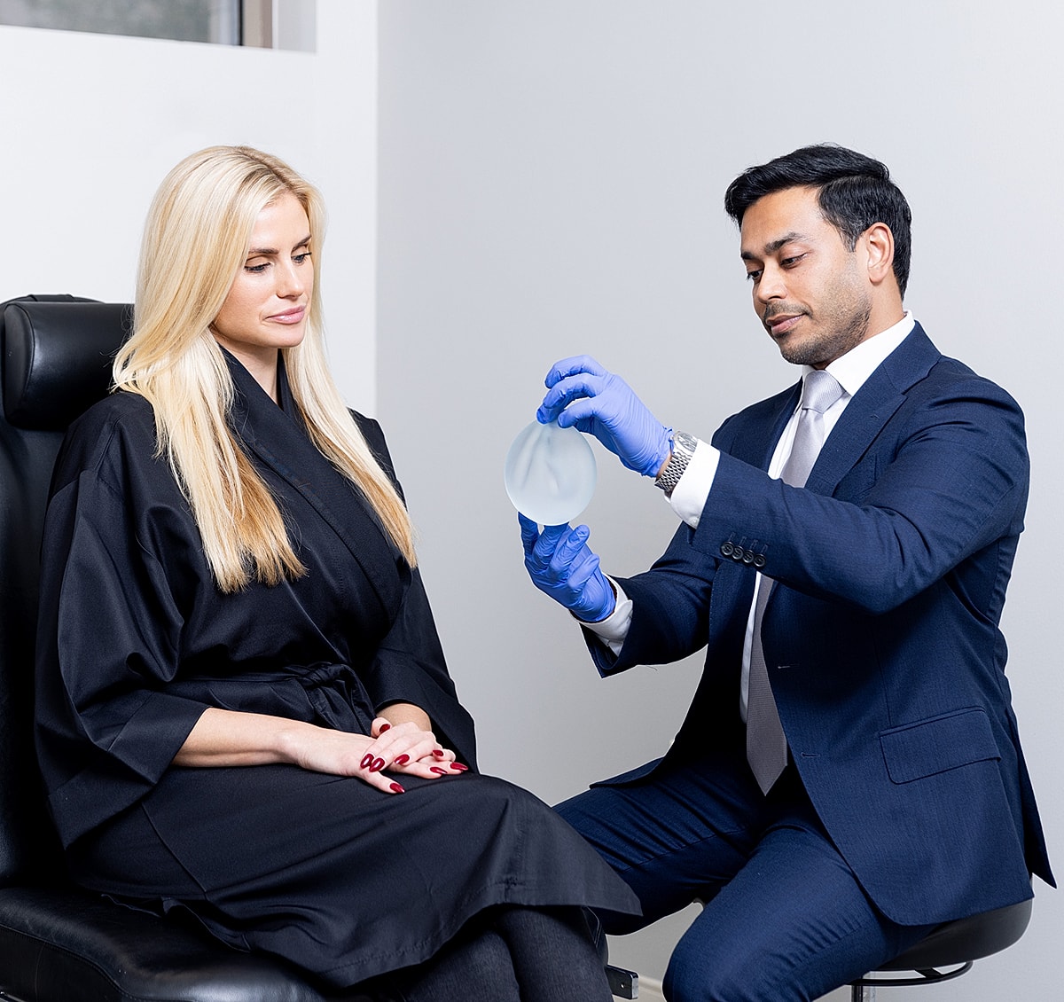 Consultation for breast augmentation procedure discussion.