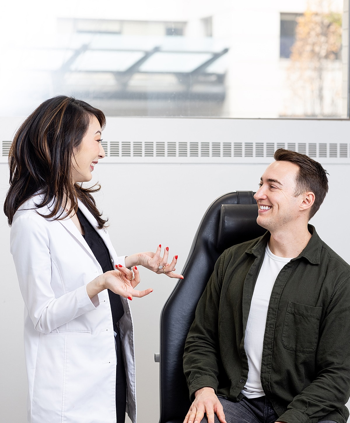 Doctor consulting with patient in a clinical setting