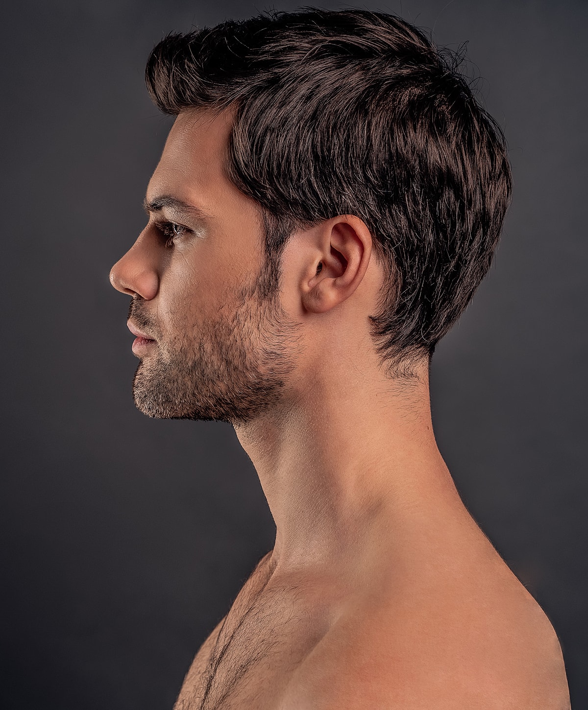 Profile of a man with short hair.