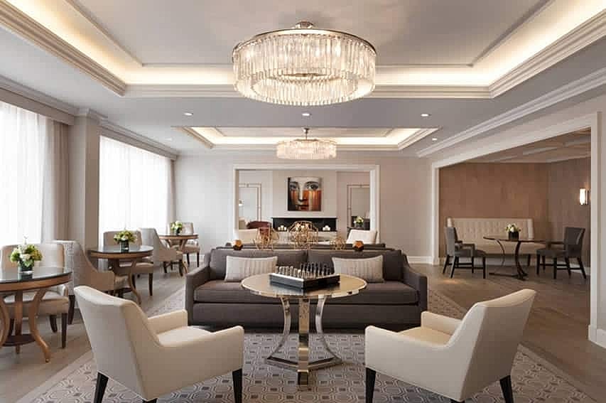 Elegant modern lounge with chandelier lighting.