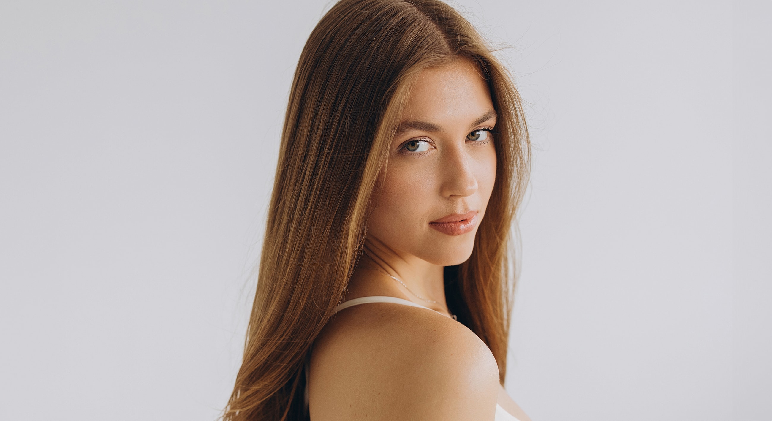 Portrait of a woman with long hair.