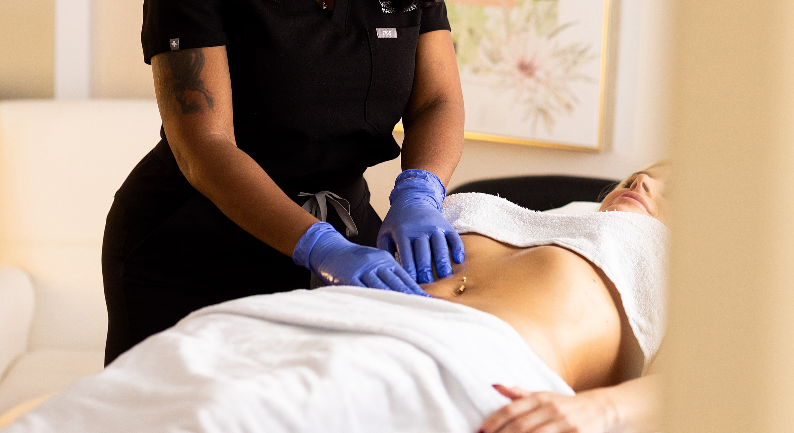 Medical professional performing a procedure on patient.